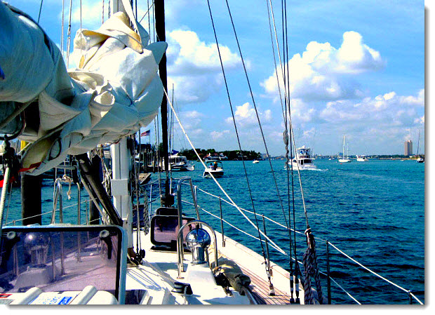 Combine the power of your rudder, engine and forward bow spring line to dock in a narrow space. See more below.