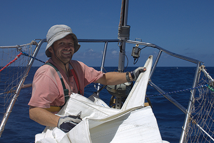 Markus swaps our heavy-weather  foresail for the twin genoa