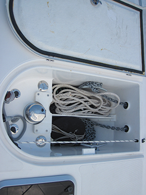 The compact chain locker and windlass on an Antares 44i catamaran