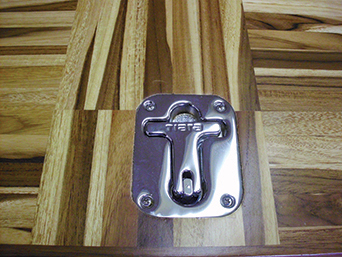 Close up of latch installed in finished hatch