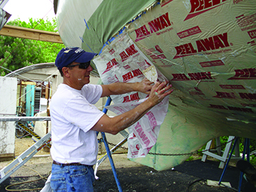 Covering Stripper with Peel Away sheeting 