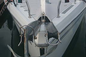 This production boat has twin rollers as standard, the owner has added the hoops to keep the anchors secure