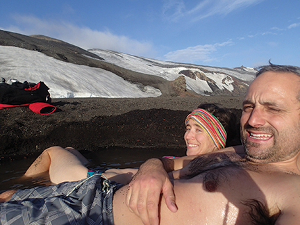 Laura and Federico relax in thermal waters at Whaler's Bay on Deception Island, their first stop after crossing the Drake. 