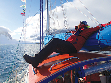 Erik relaxing as Quijote passes through the Peltier Channel after visiting Port Lockroy.