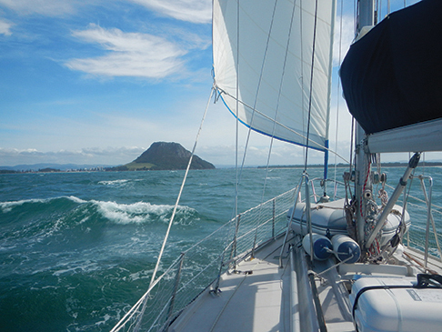 Approaching Mount Maunganui and Tauranga, a good base for boat work and inland travel.