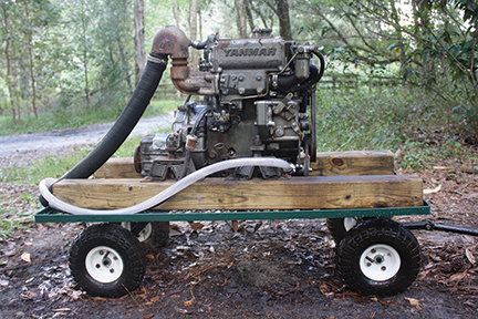 A practice engine: this 2 cylinder Yanmar diesel is mounted on a garden cart for convenience