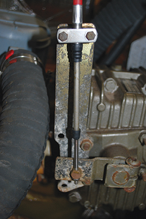 New cable in place, showing push rod and swivel connection to the transmission base