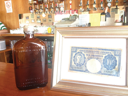 Original bottle of whisky and 10 shilling Jamaican note from the SS Politician