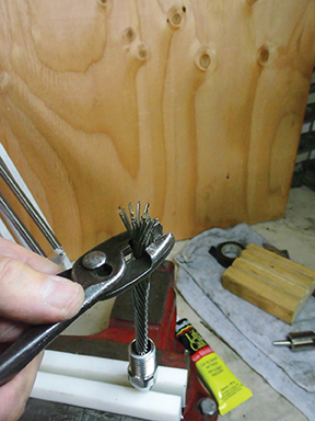 C A quick counter-clockwise twist with a pair of pliers easily unwraps the outer wires.