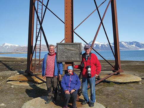 Hookon, Judith and Odd  in front of the mast to twhich Amundsen's airship was tied in 19926, Ny Alesund